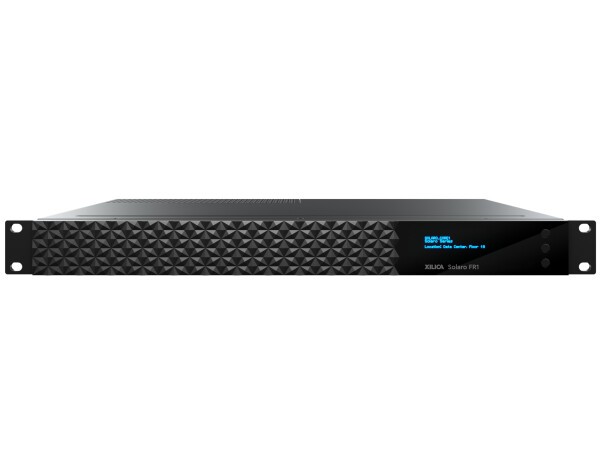 Xilica DSP core with 64x64 Dante on a dual NIC, 16 user-configured card slots, Lua scripting engine, optional software-licensed HearClear AEC.