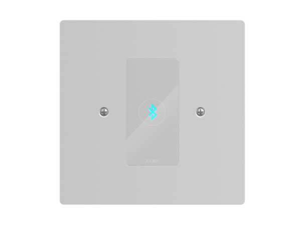 Xilica Bluetooth 5.0 to Dante module, PoE-powered with single Cat5/6. Mounts into single-gang EU/UK wall-box, includes white coated aluminium faceplate.